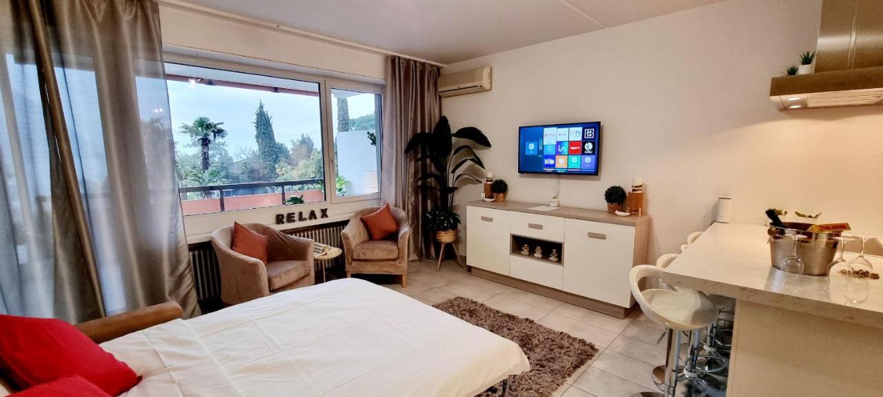 Relax-Lugano Lake Bissone Εξωτερικό φωτογραφία
